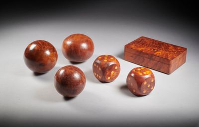 six pieces of wood with a wooden box in the background