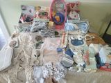 a table with a lot of baby items on it