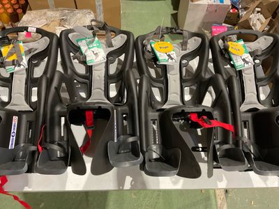 a lot of baby strollers that are on the table