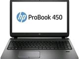 L'ordinateur portable HP ProBook 450 est ouvert sur un fond blanc