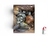 a box full of old metal items that are in it