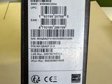a black box with a barcode on it sitting on a table