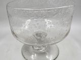 a clear glass bowl with bubbles on it