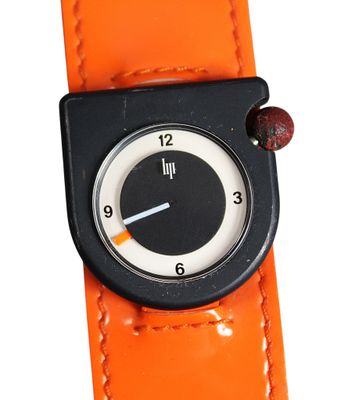 a close up of a watch on a white background
