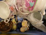 a blue tray with a bunch of cups and saucers on it