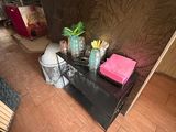a table with a bunch of items on it in a room
