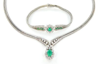 un ensemble composé d'un collier et d'un bracelet en émeraudes et diamants