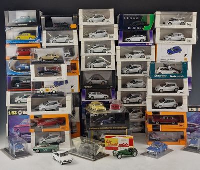 a lot of toy cars that are stacked up together