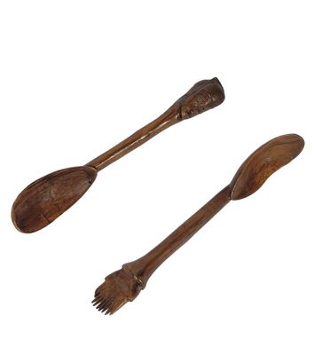two wooden spoons and a fork on a white background