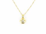 un collier plaqué or orné d'un diamant, monté sur une chaîne