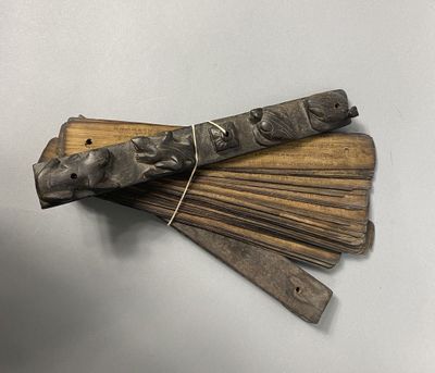 a close up of a bunch of sticks of wood on a table