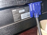 a close up of a blue cable connected to a computer