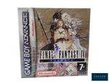 a close up of a nintendo game box with an image of a woman and a man