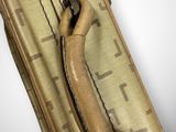a piece of luggage that has a handle on it