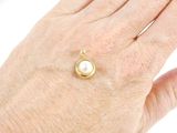 a woman ' s hand that has a ring on it