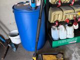 an image of a garage with a mop, bucket, and other items