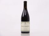 a bottle of wine that is sitting on a table