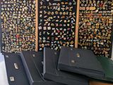 a lot of different types of pins on the wall