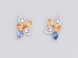 a pair of sapphire and diamond earrings