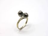 a close up of a silver ring with a skull on it