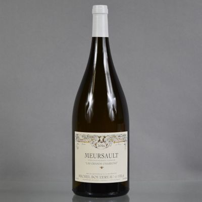 a bottle of wine that is sitting on a table