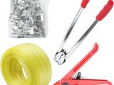 some tools that are laying out on a white surface