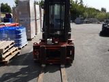 a forklift that is parked in a parking lot