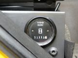 a close up of a motorcycle with a clock on it