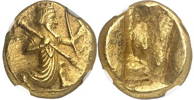 a gold coin with an image of a woman holding a sword