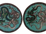 pair of two chinese dragon plates with blue background