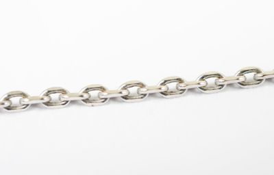 a close up of a silver chain on a white background