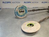 an image of a wheel and a disc on a table