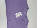 the purple shirt has a tag on it that says it is not a shirt