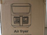 une boîte en carton contenant une friteuse à air chaud