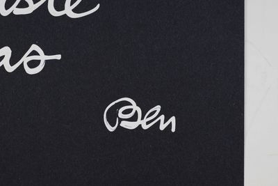 a black book with white writing on the cover