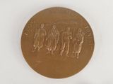 an image of a gold medal with a group of people on it