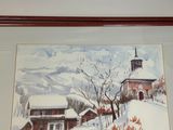 two framed pictures of a farm in the snow