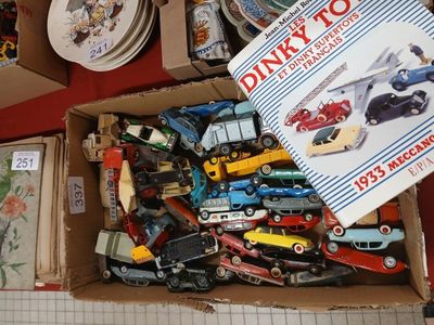 a box full of toy cars sitting on a table