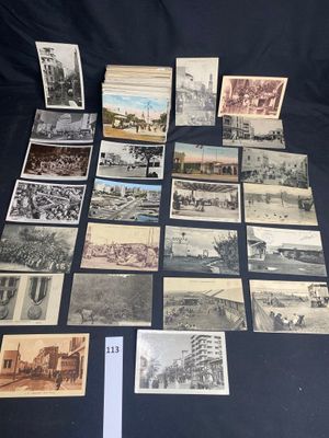 several old postcards of different types and sizes on a table