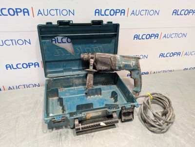 a tool in the case that is sitting on the floor