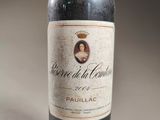 a bottle of wine that is sitting on a table