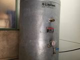 a water heater that is sitting in a room