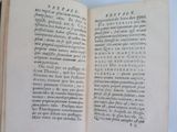 a book open to a page that has writing on it
