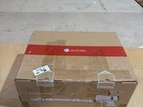 a box that is sitting on the floor with a price tag on it
