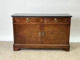 a wooden cabinet with two drawers and a marble top