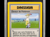 a close up of a pokemon card with a yellow border