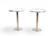 pair of round side tables with metal bases