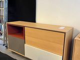 two drawers and a cabinet in the corner of a room