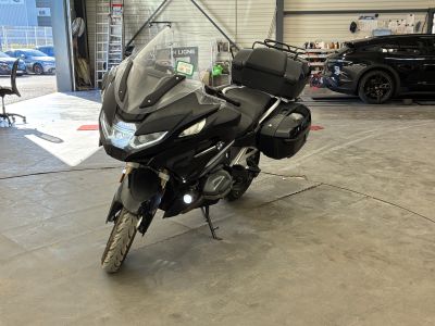 a motorcycle that is parked in a garage