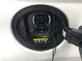 a close up of a car ' s plugged in to a vehicle